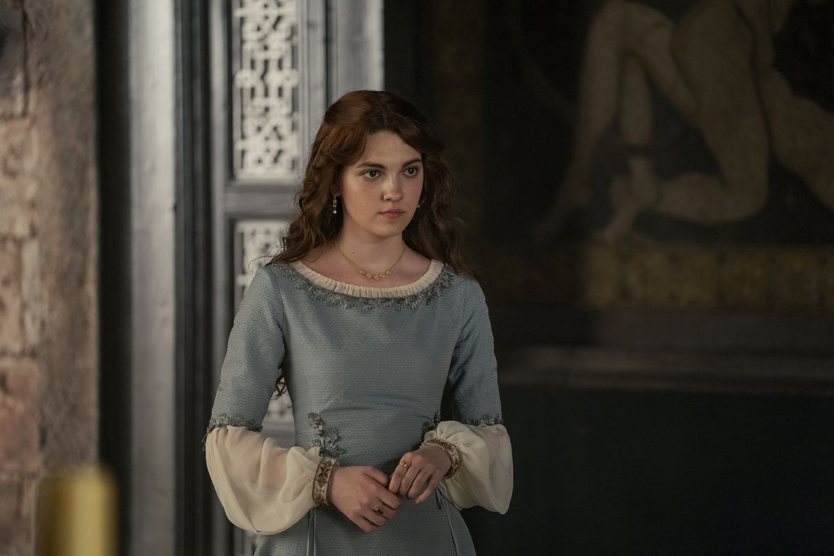 Alicent Hightower stands with her hands in front of her looking ahead in House of the Dragon.