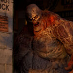 Imagem oficial de State of Decay 3 mostrando um sobrevivente em meio à natureza selvagem.